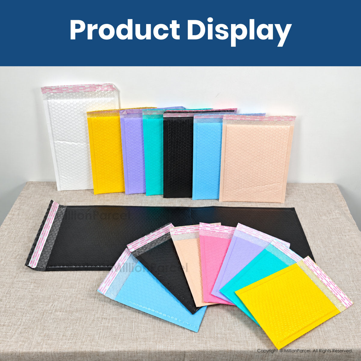 Assorted-color bubble polymailer envelopes, stacked and ready for mailing